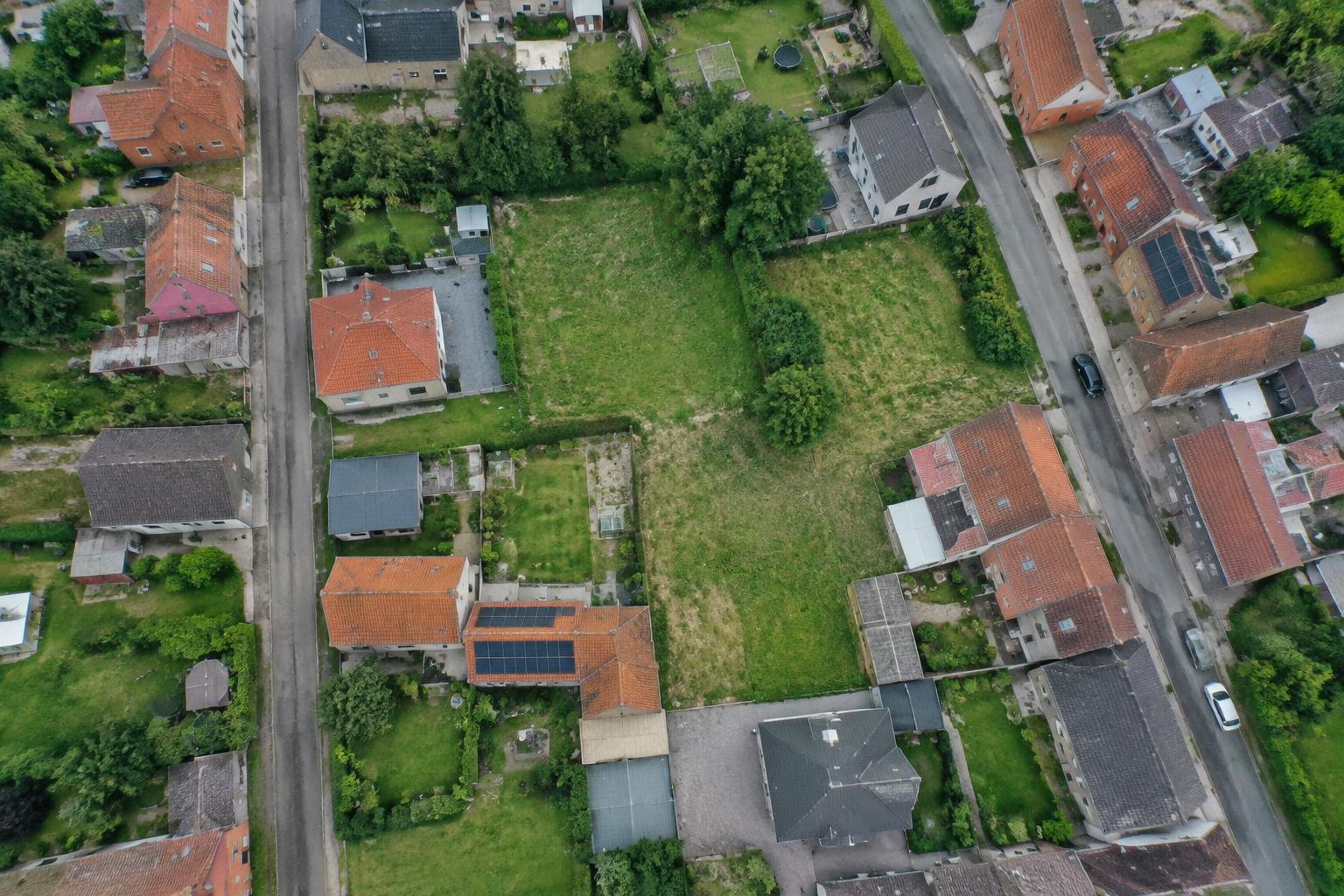 Luchtfoto van percelen in een Vlaamse woonwijk
